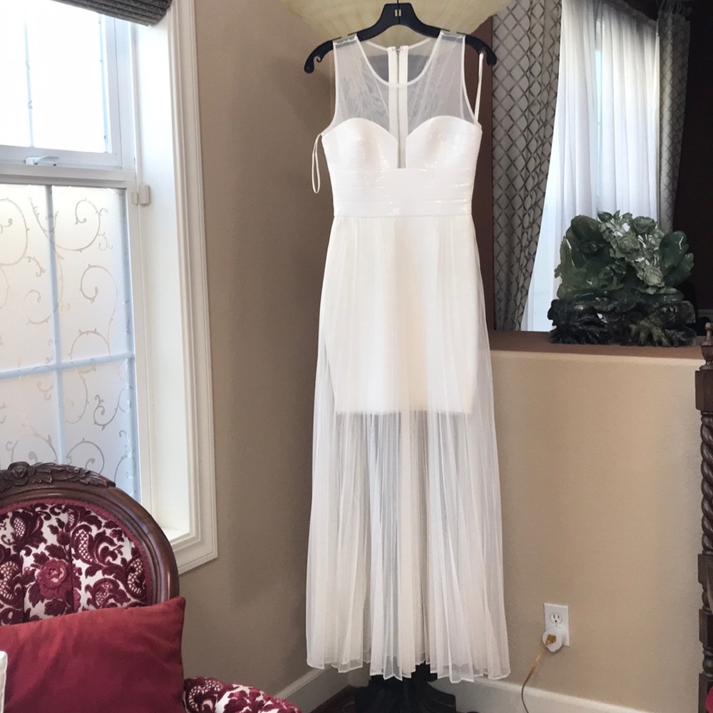 Beautiful BCBG sequins dress with pleated skirt